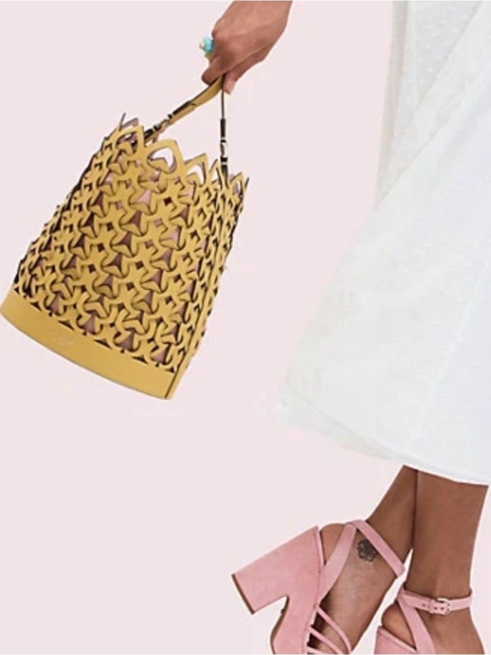 kate spade Yellow Cutout Leather Bucket Shoulder Bag with Pink Liner - Picture 3 of 9